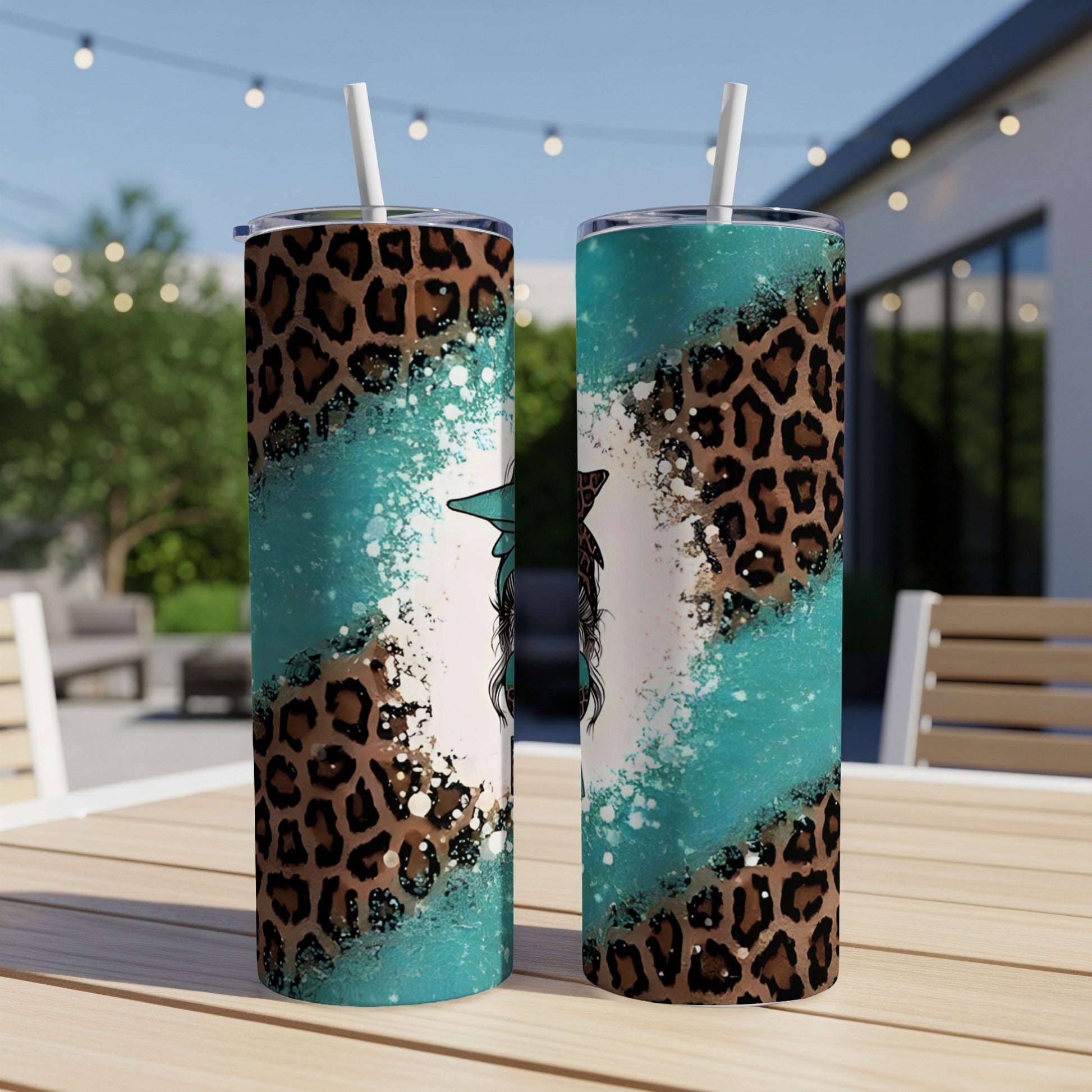 Two tumblers with leopard print and teal paint splatter designs.
