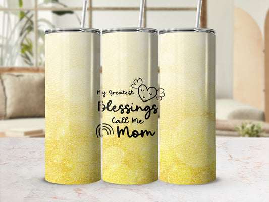 Gold glitter tumbler with "My greatest blessings call me Mom" text.