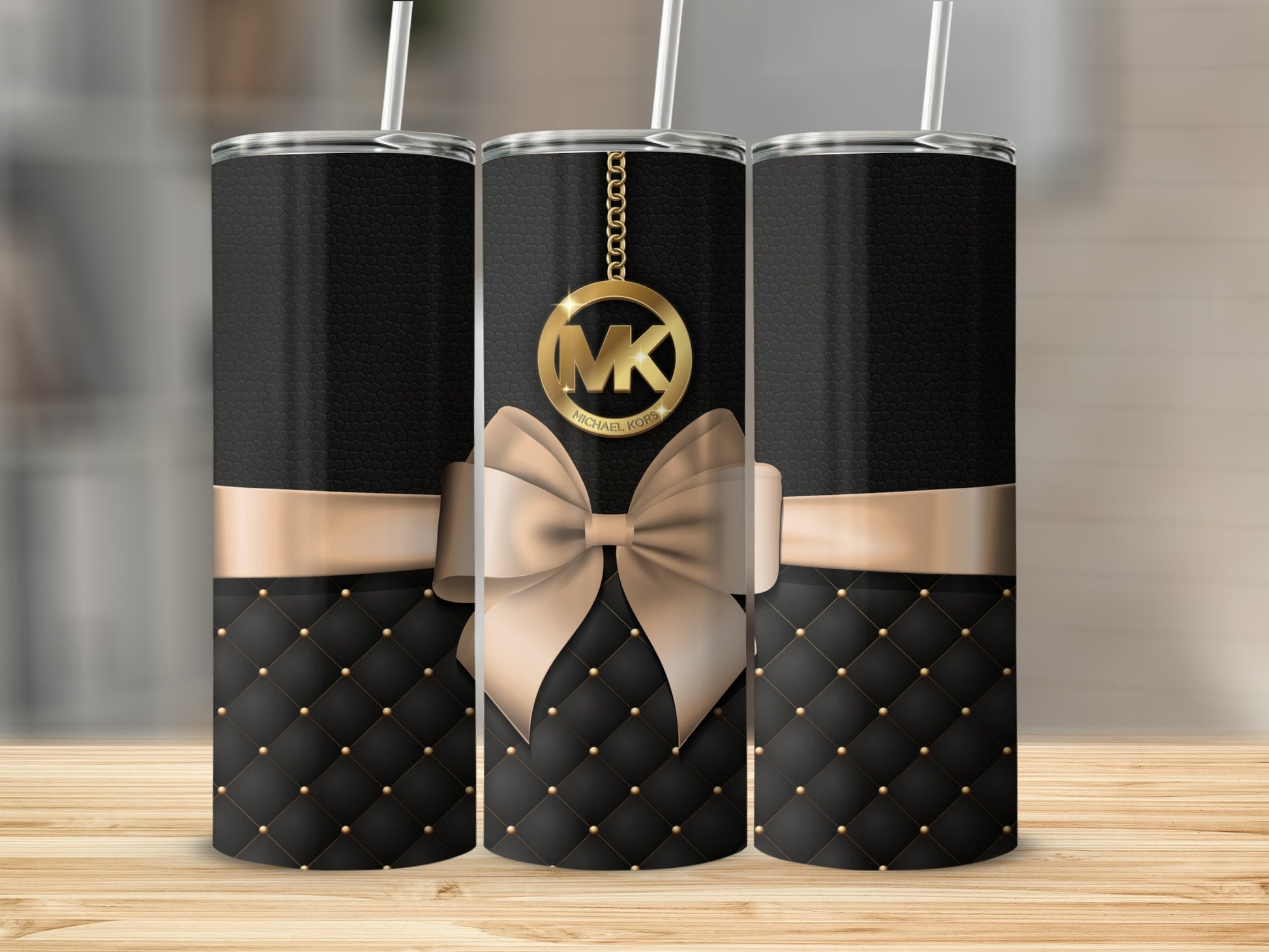 Black and Gold Bow Design with MK Logo Tumbler