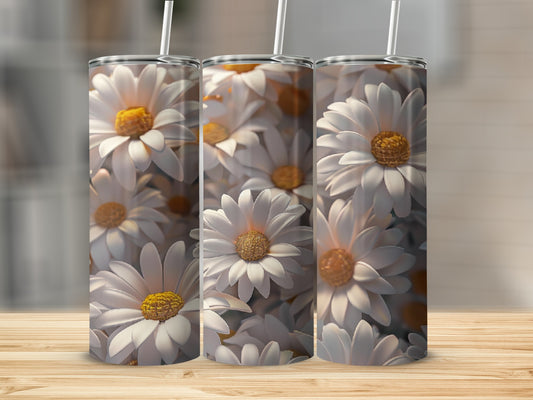 Three tumblers featuring a close-up pattern of white daisies with yellow centers.