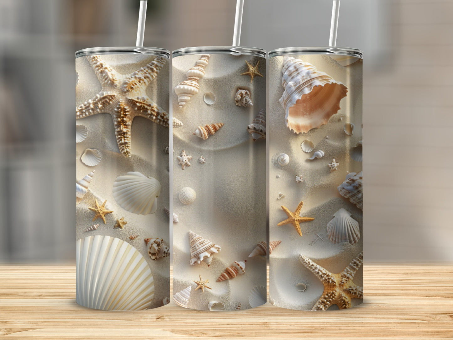 Beach seashells and starfish design on three tumblers.