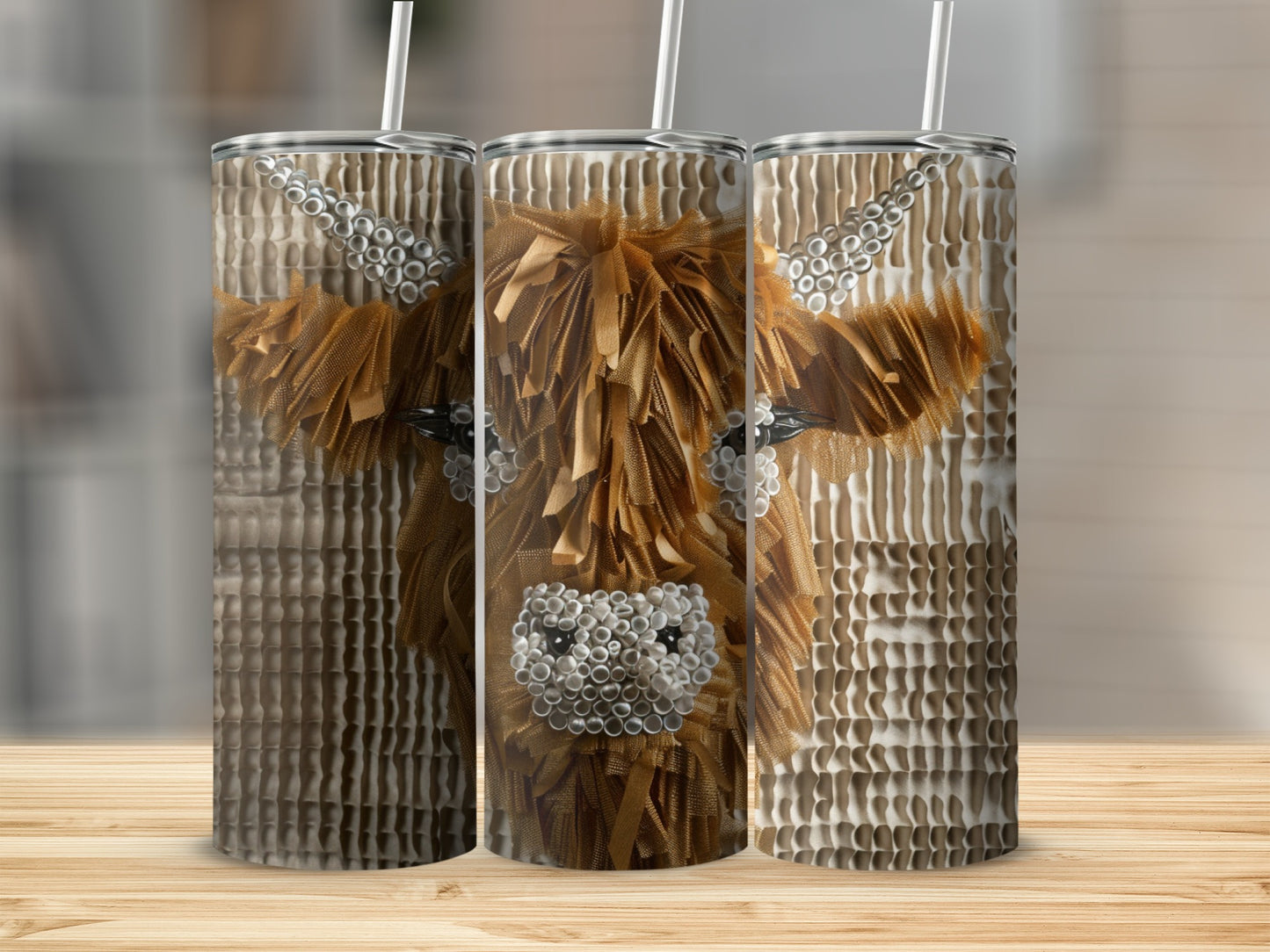 Brown and white Highland cow tumbler with textured straw.