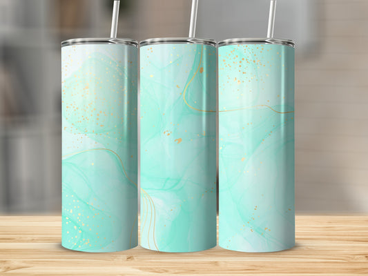 Three tumblers with mint green marbled design and gold glitter accents.