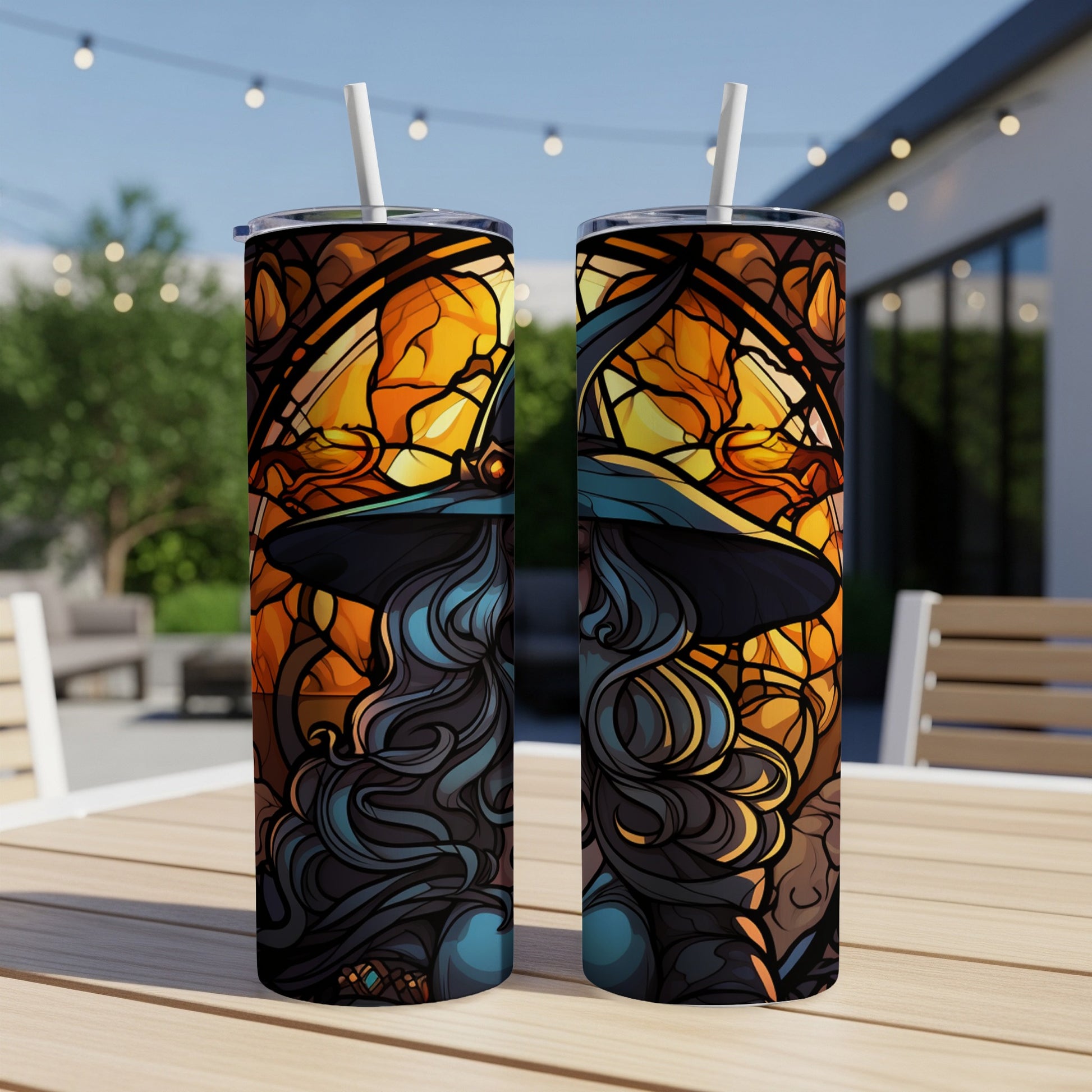 Two tumblers with a witch wearing a black hat against a stained-glass background.