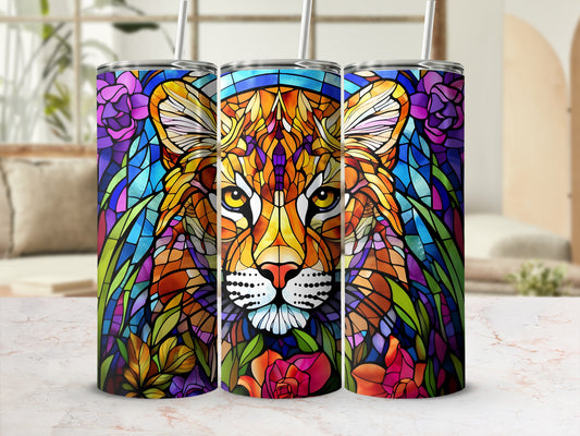 Tryptic stained glass tiger face with colorful floral accents.