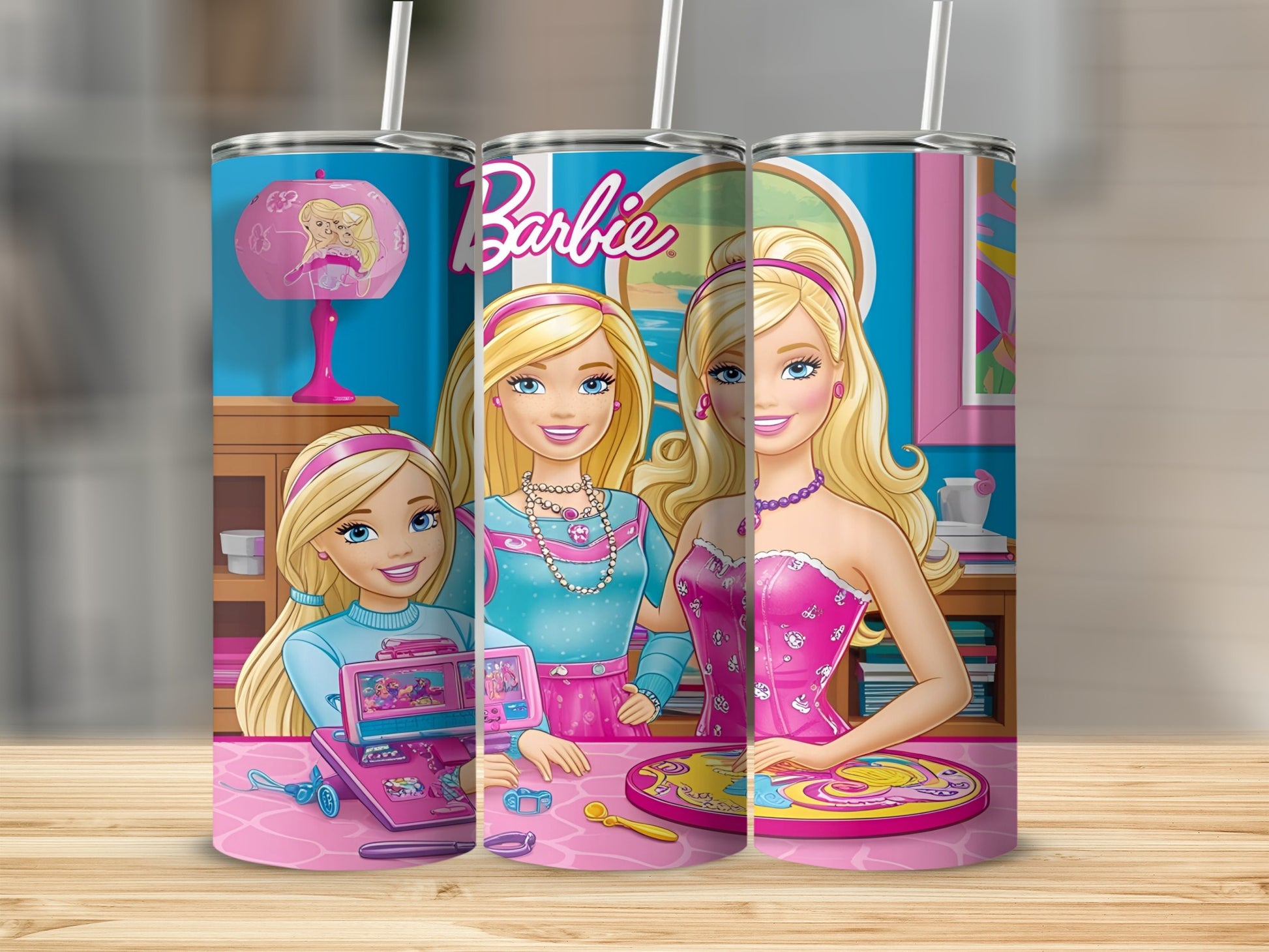 Three Barbie illustrations on a pink tumbler with straws.