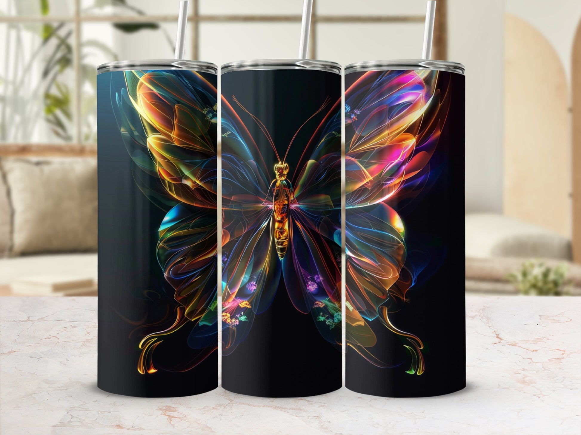 Three tumblers with a vibrant, colorful abstract butterfly design.