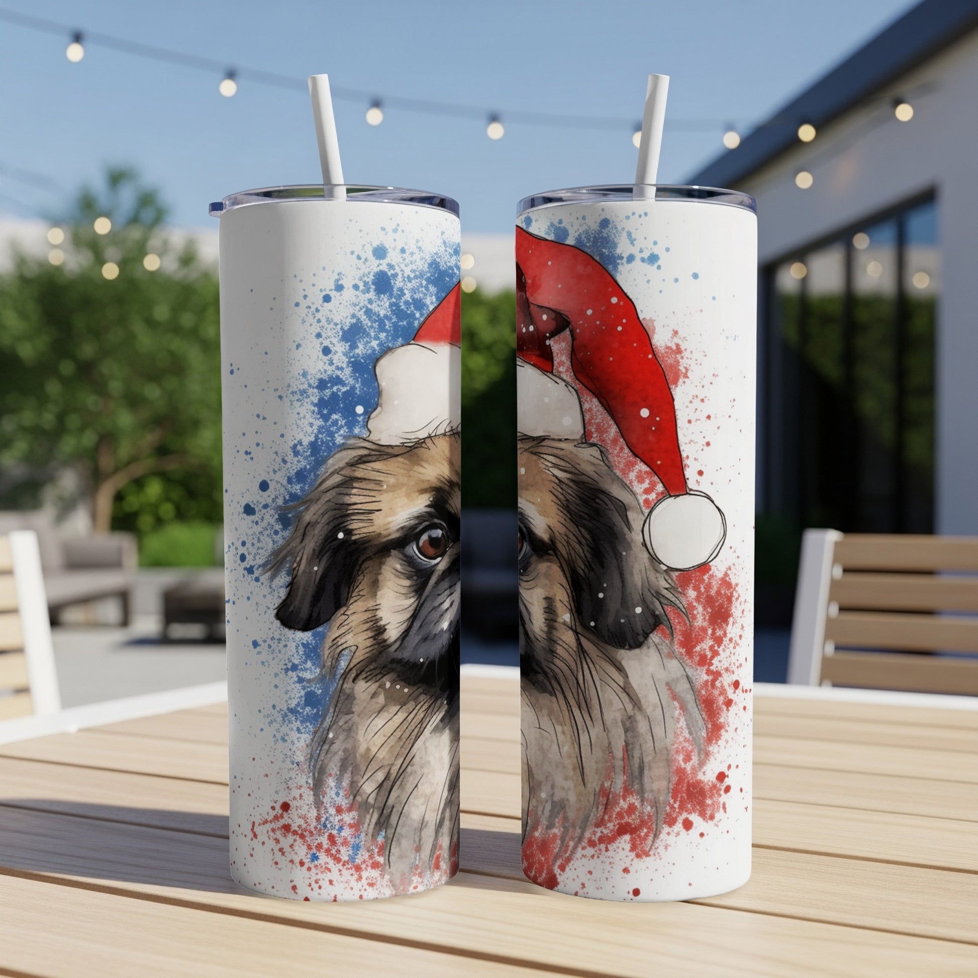 Christmas dog illustration on white insulated tumblers with straws.