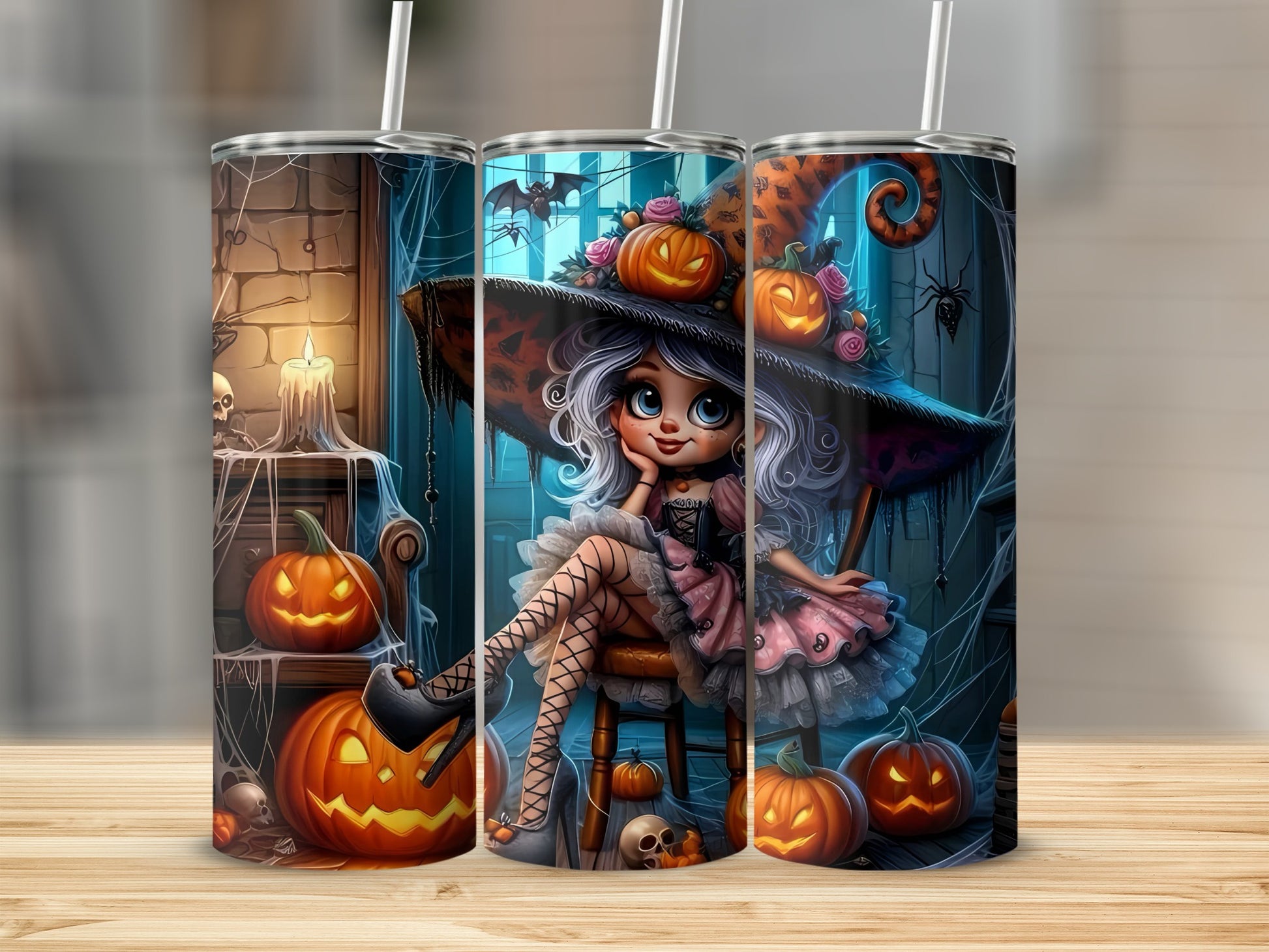 Halloween witch and pumpkins design on three tumblers with straws.