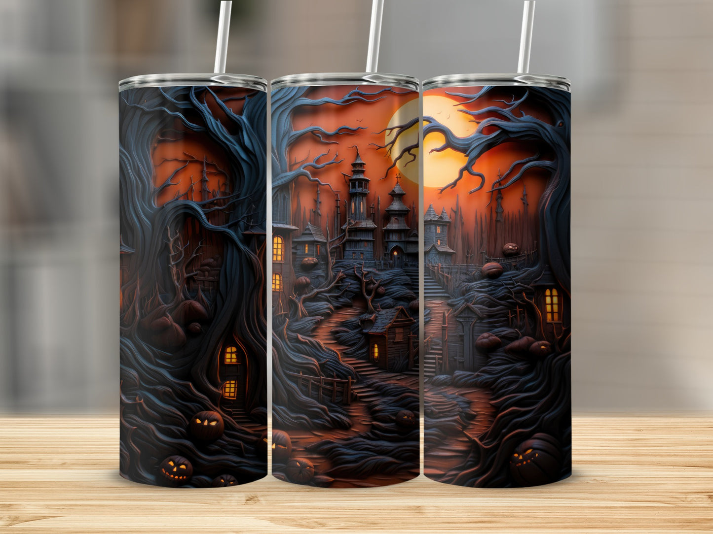Three tumblers with a dark, spooky Halloween haunted house and jack-o'-lantern design.