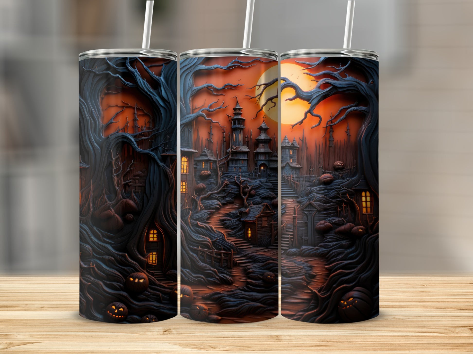 Three tumblers with a dark, spooky Halloween haunted house and jack-o'-lantern design.
