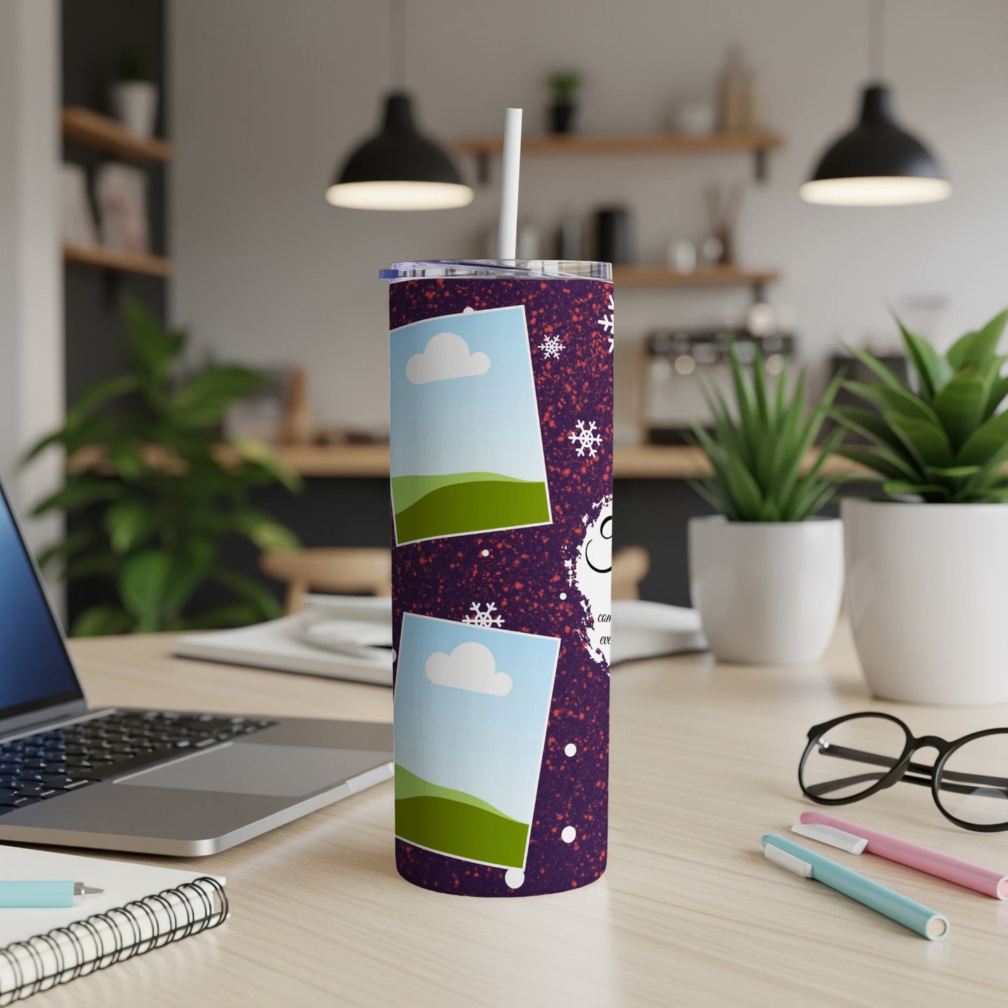 Tumbler with purple background, snowflakes, and two photo frames of landscape.