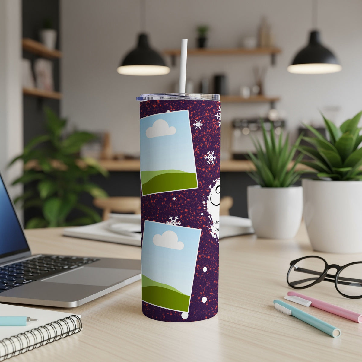Tumbler with purple background, snowflakes, and two photo frames of landscape.