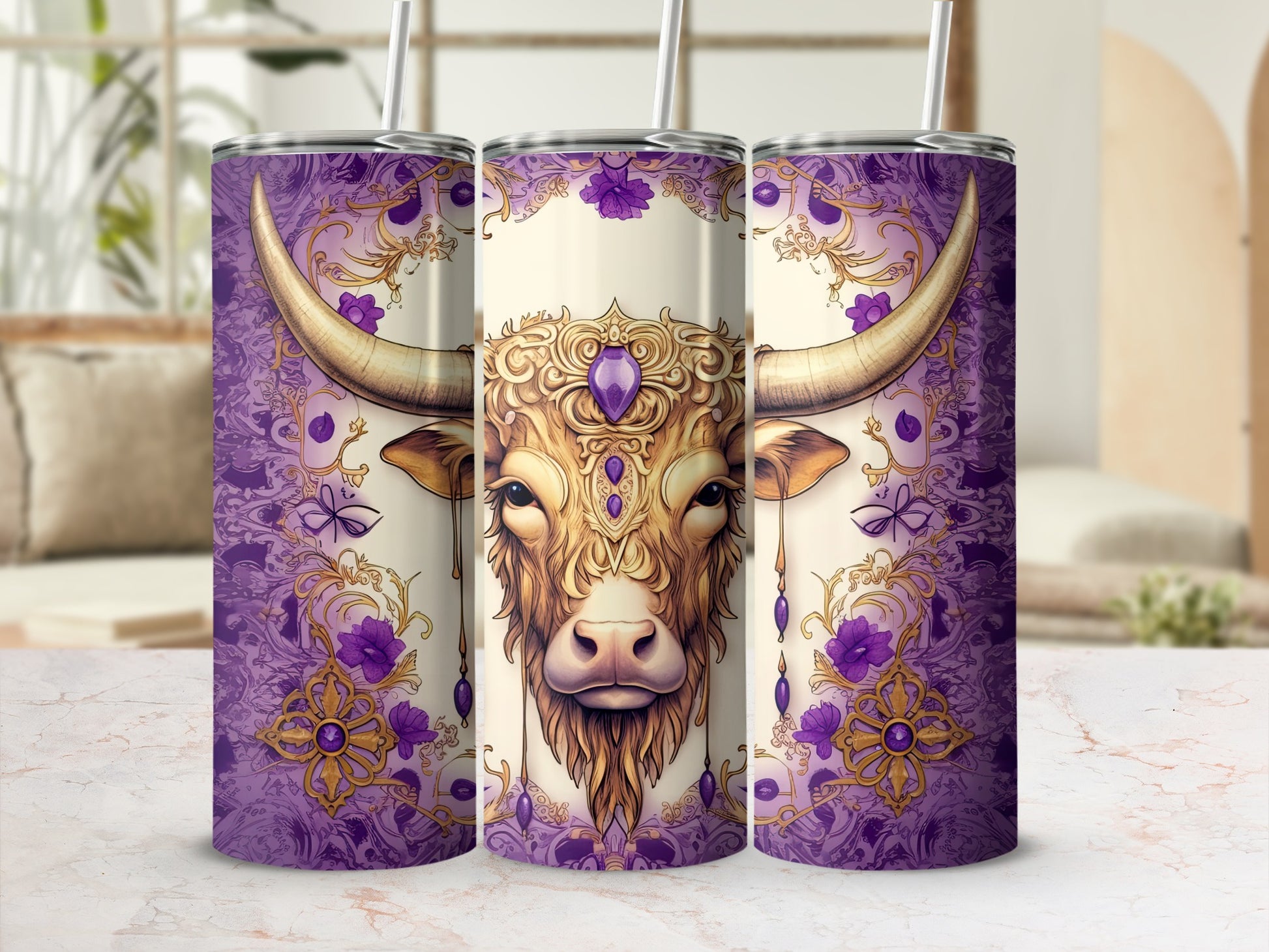 Purple tumbler with gold bull head design and floral accents.