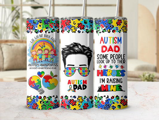 Three tumblers with autism awareness designs and text.