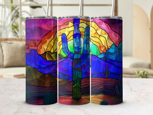 Stained glass tumbler with desert sunset, cactus, and mountains.