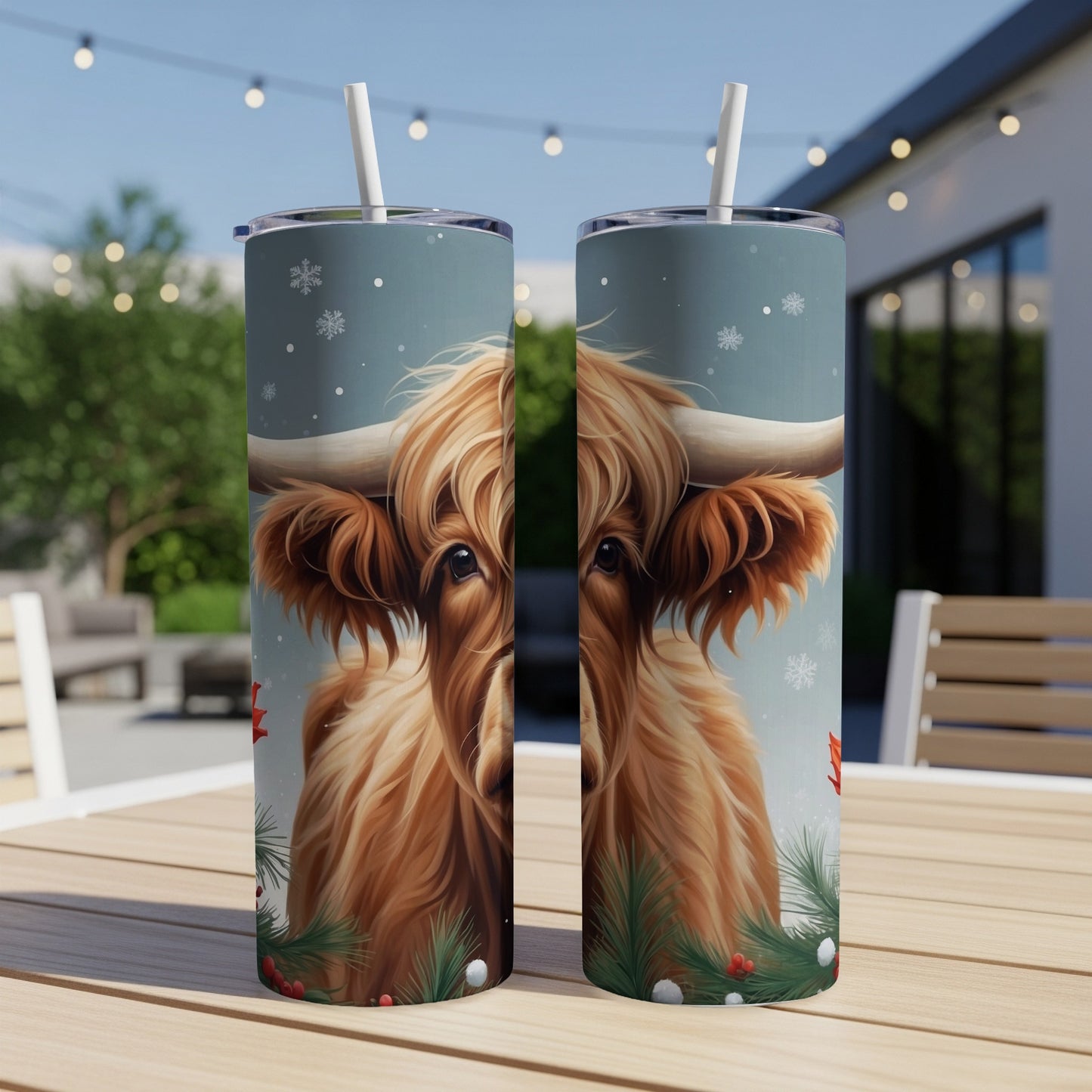 Highland cow with Christmas garland, snowflakes, and festive background on a tumbler.