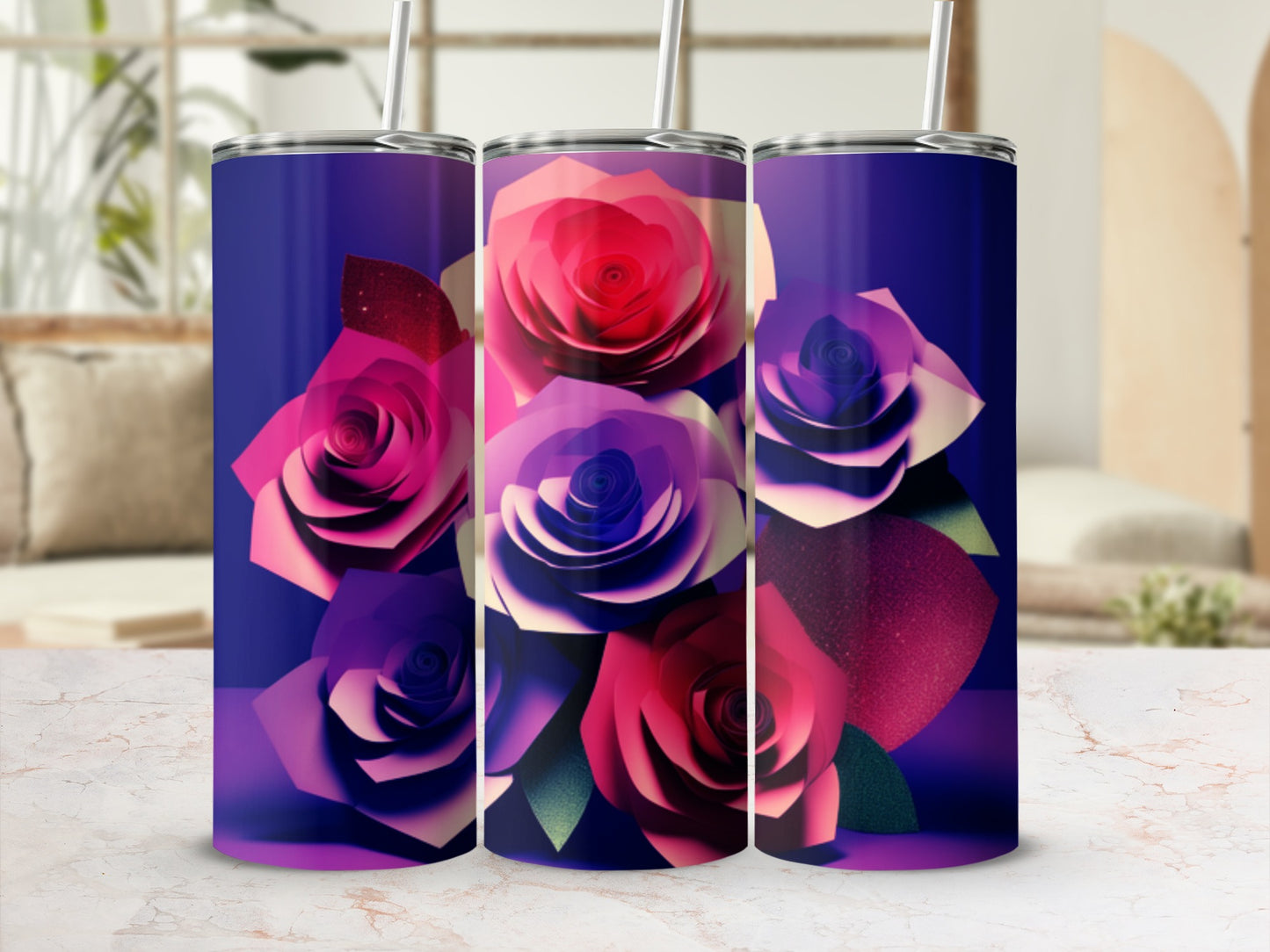 Three tumblers with a floral design of roses in shades of pink and purple.