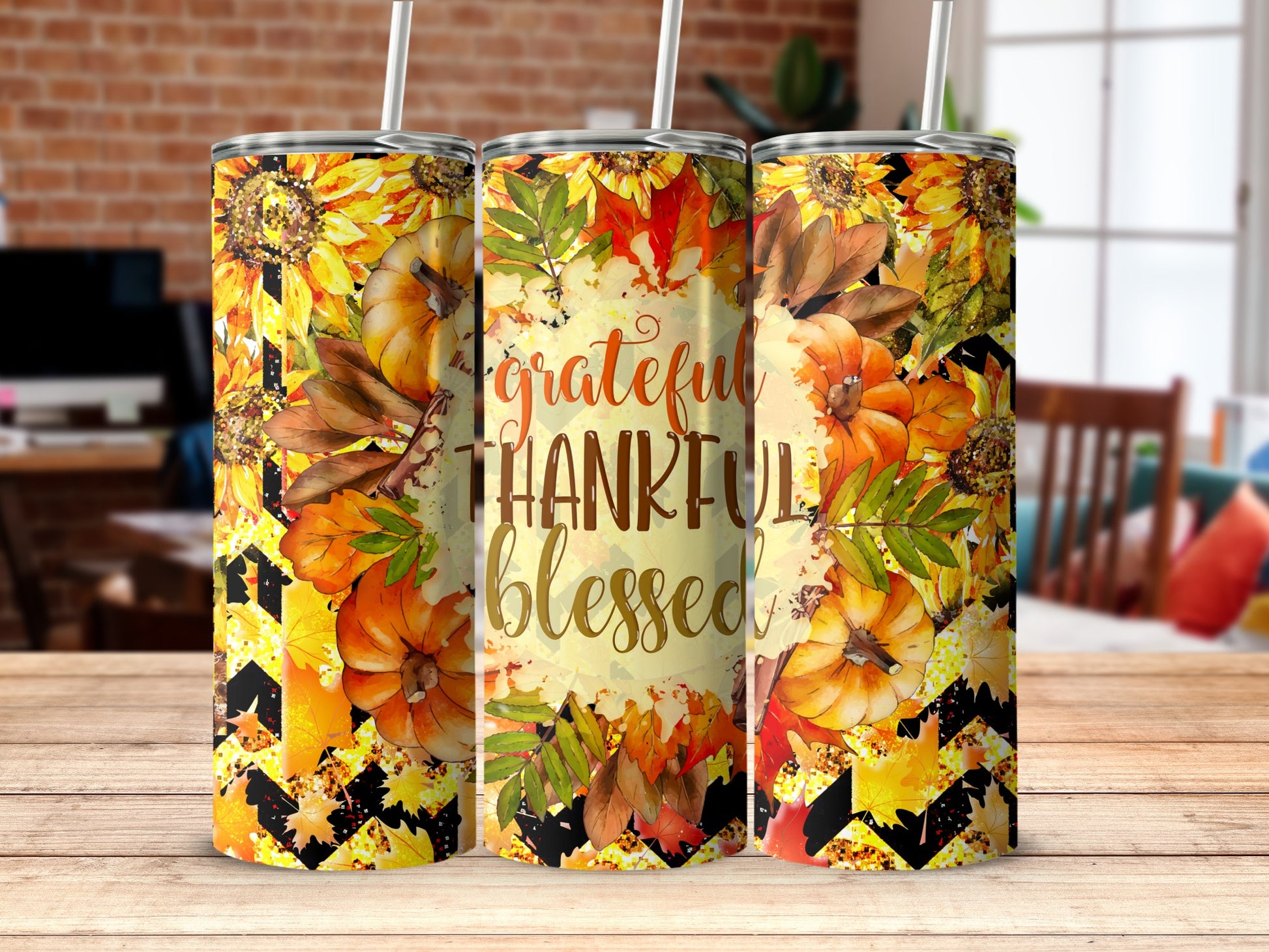 Thankful Blessed tumbler with pumpkins, sunflowers, and autumn leaves.