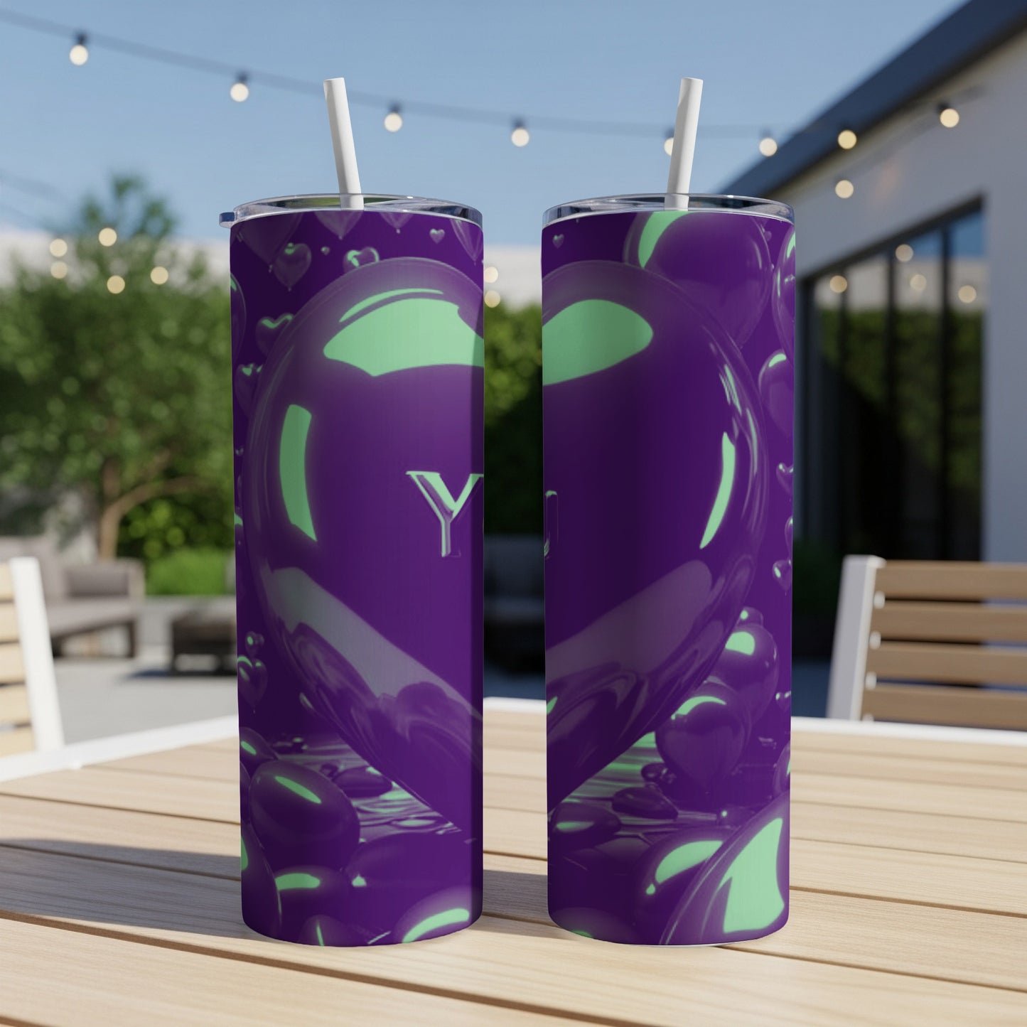 Purple tumbler with glowing green hearts and the letter "Y".