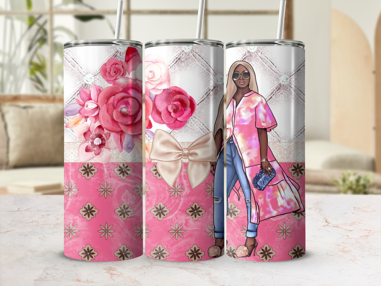 Pink floral tumbler with a woman in a pink jacket and jeans.