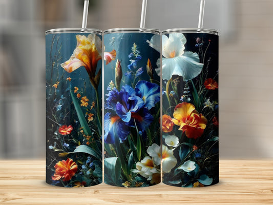 Three tumblers featuring colorful floral designs of irises and other flowers.