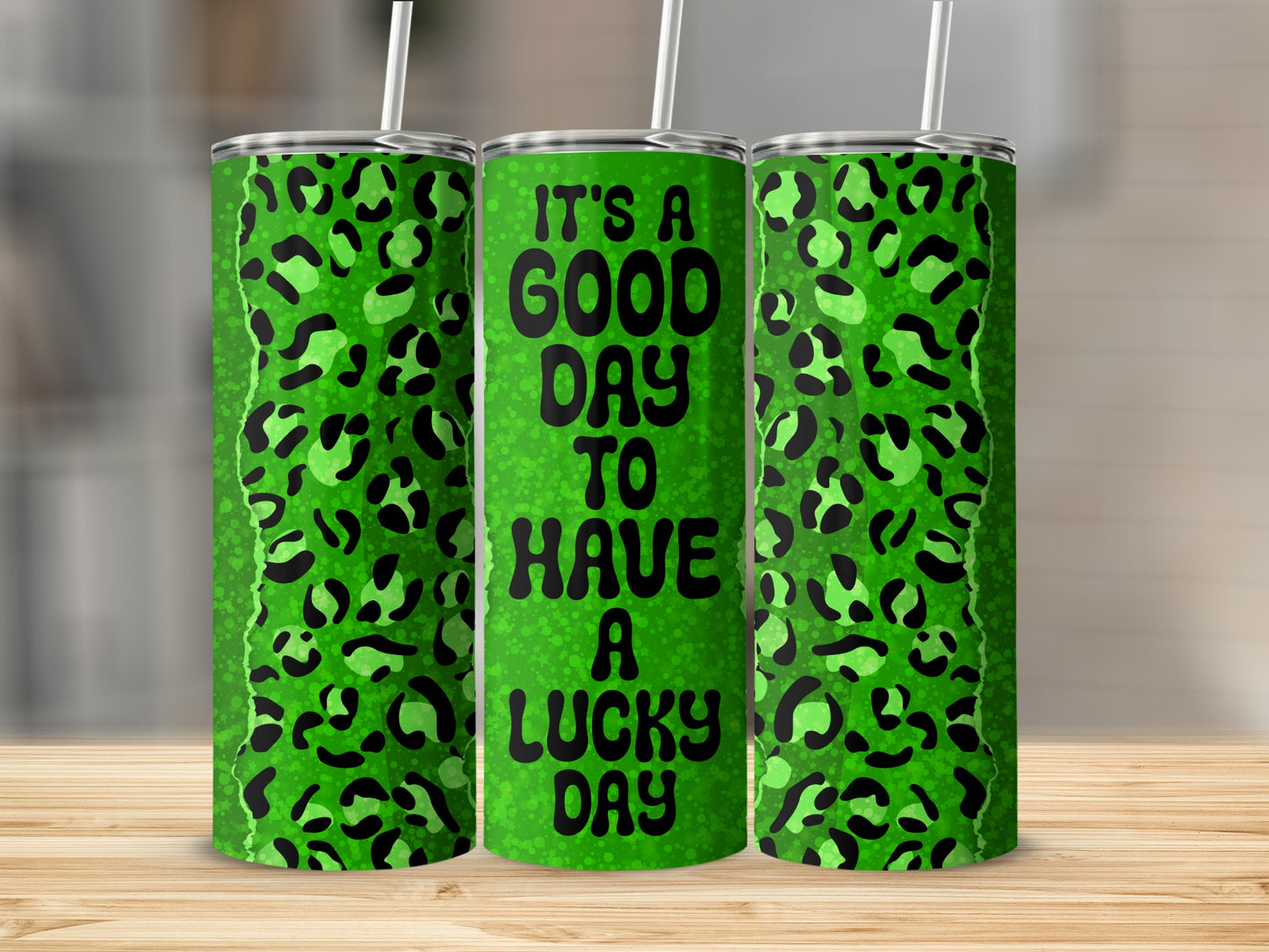 Green leopard print tumbler with text "It's a good day to have a lucky day."