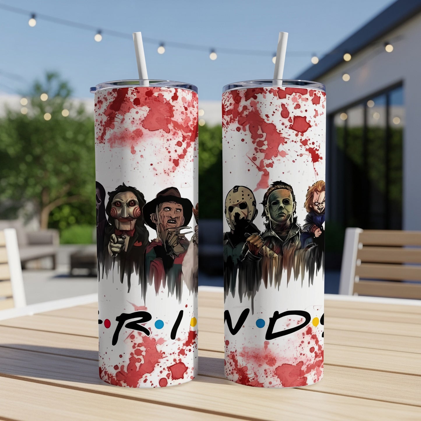 Horror movie villains on white tumblers with red splatters and "FRIENDS" logo.