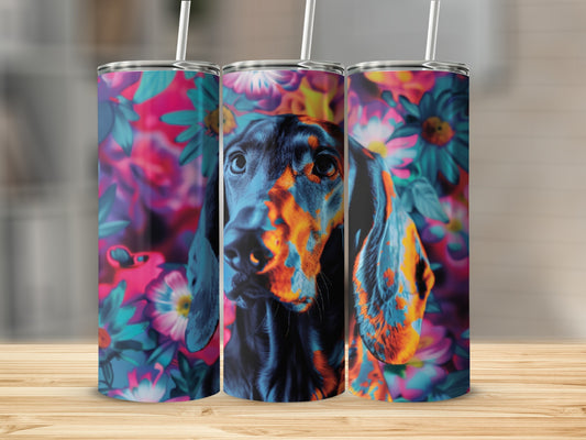 Black dog with floral background on a 30 oz tumbler.