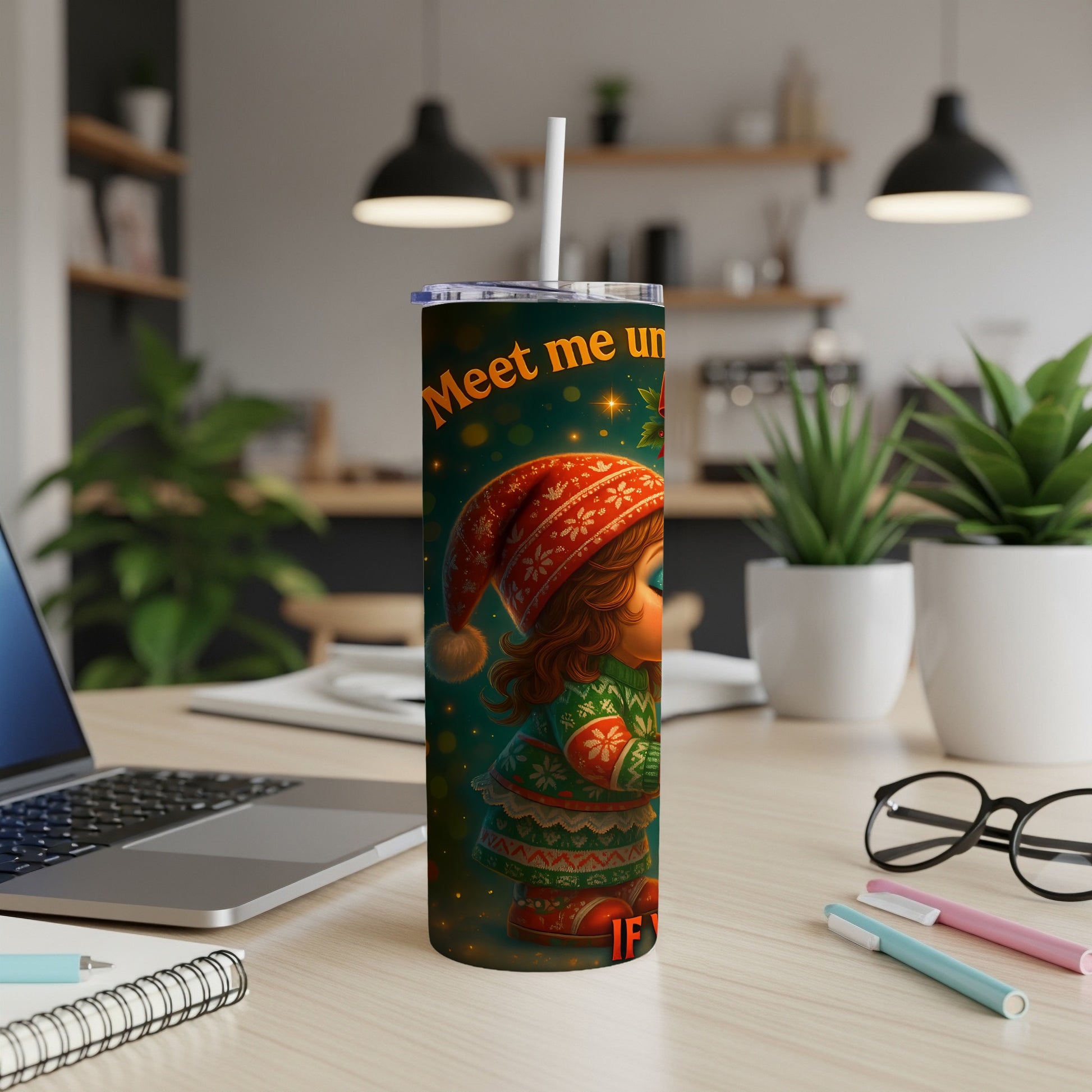 Tumbler with "Meet me un" and a Christmas elf design.