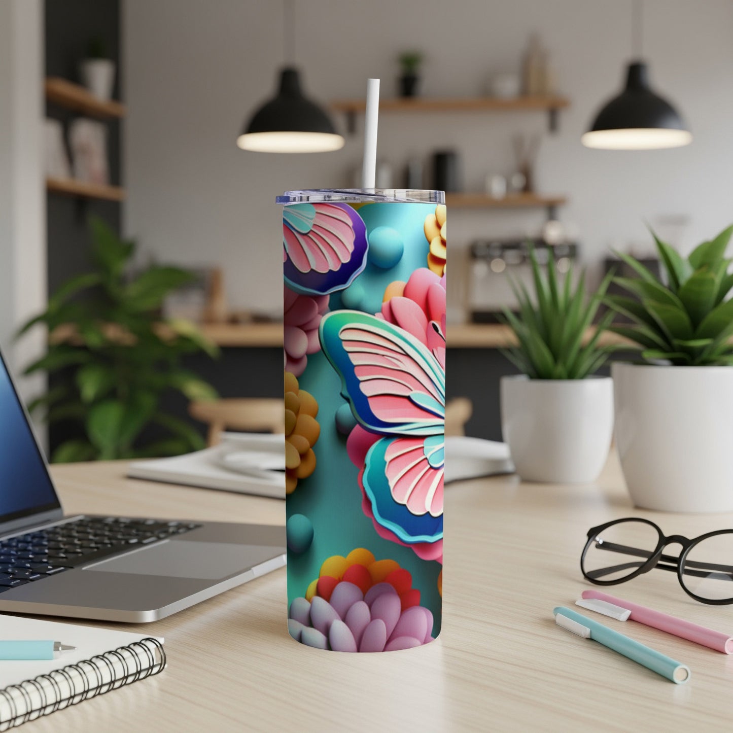Tall tumbler with a colorful butterfly and floral pattern.