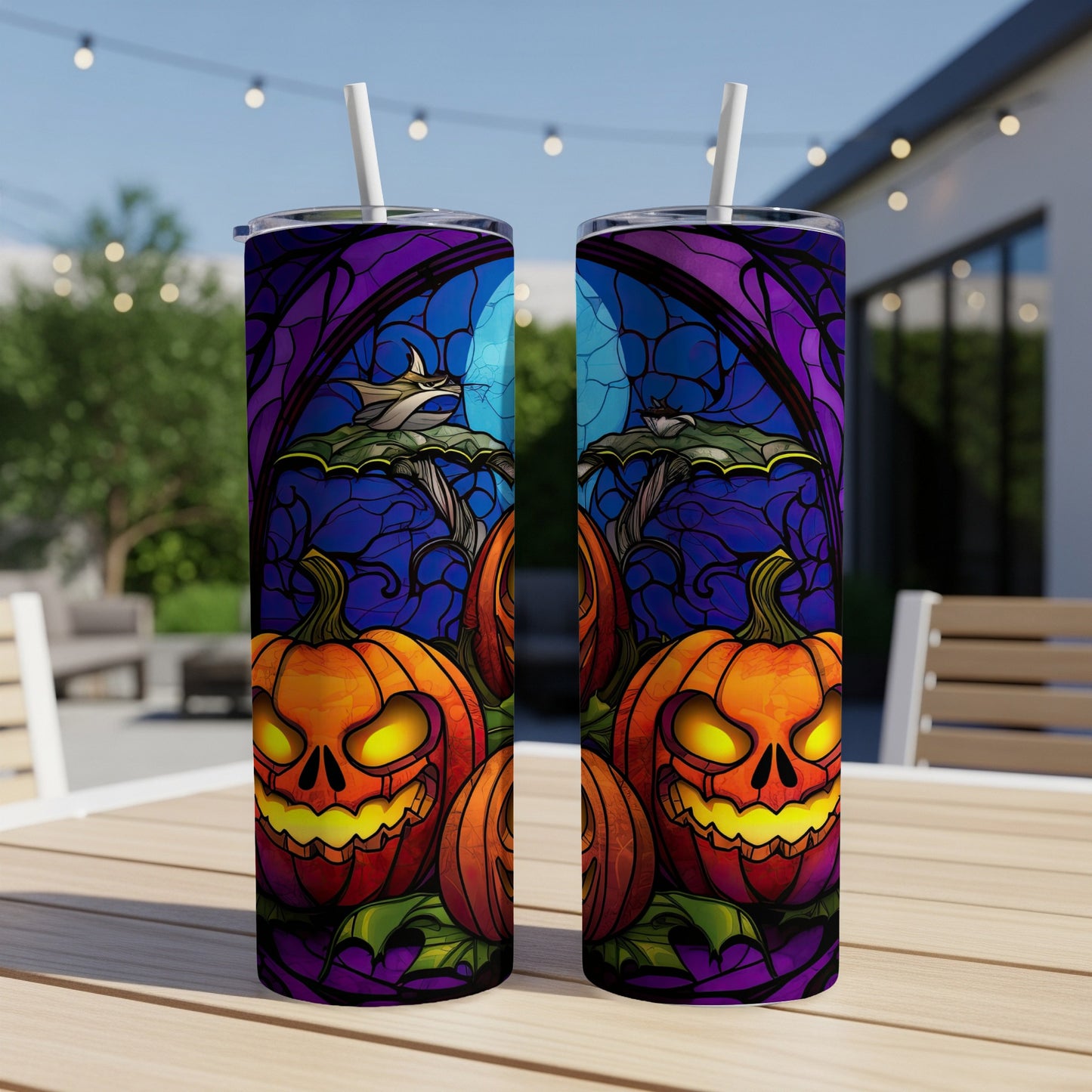 Two tumblers feature a stained-glass design of jack-o'-lanterns and bats.