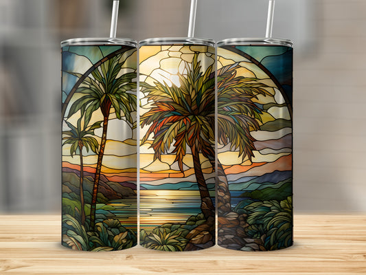 Stained glass design of palm trees on a beach at sunset.
