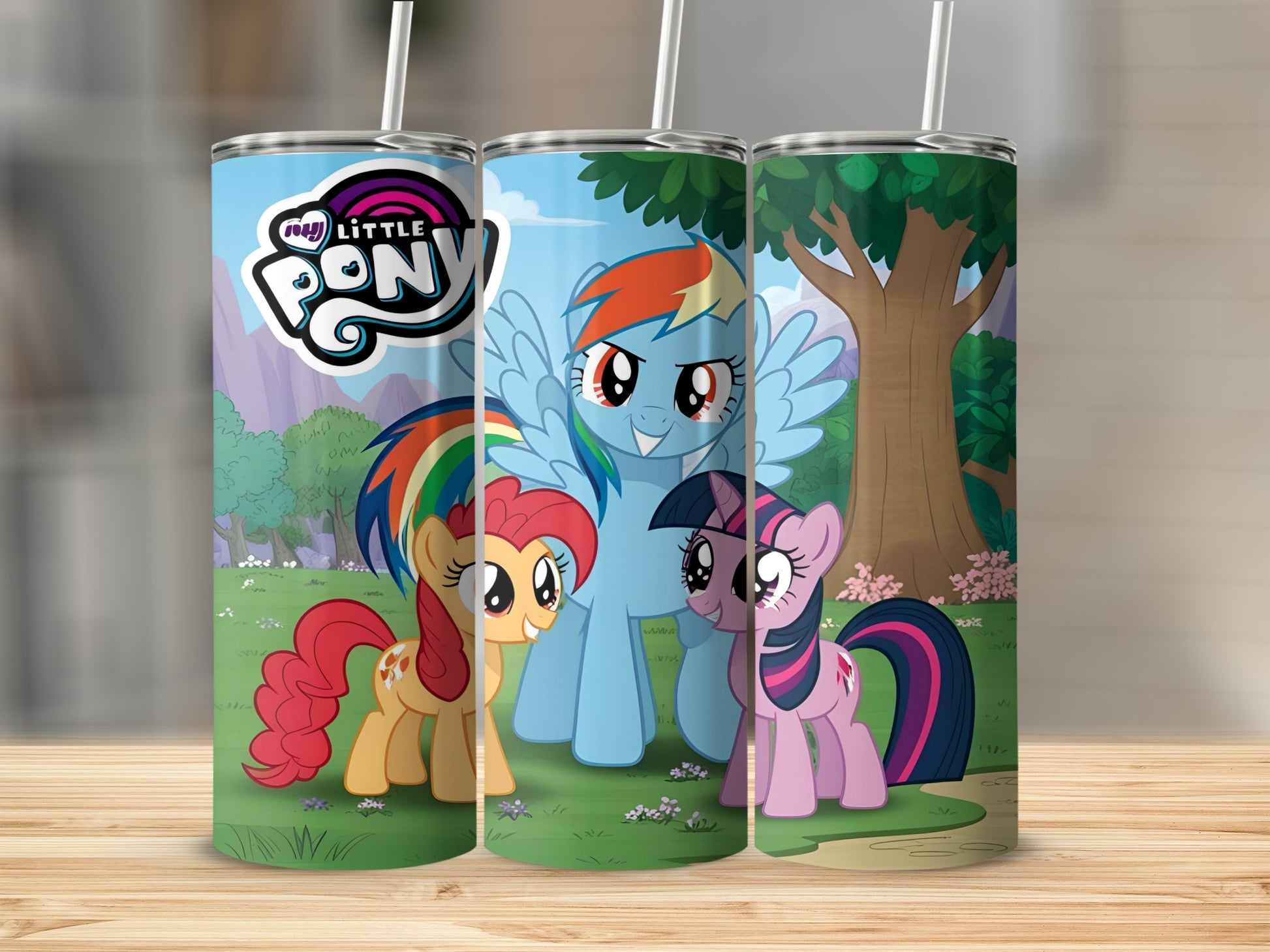 My Little Pony characters Rainbow Dash, Applejack, and Twilight Sparkle on a tumbler.