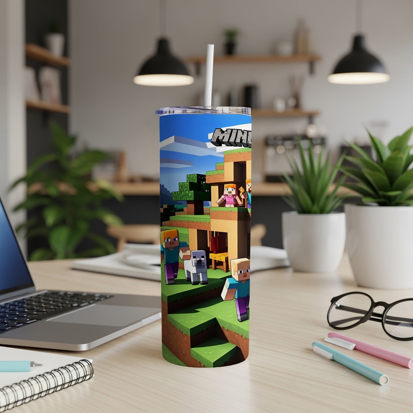 Minecraft tumbler with characters and buildings, featuring a white straw.