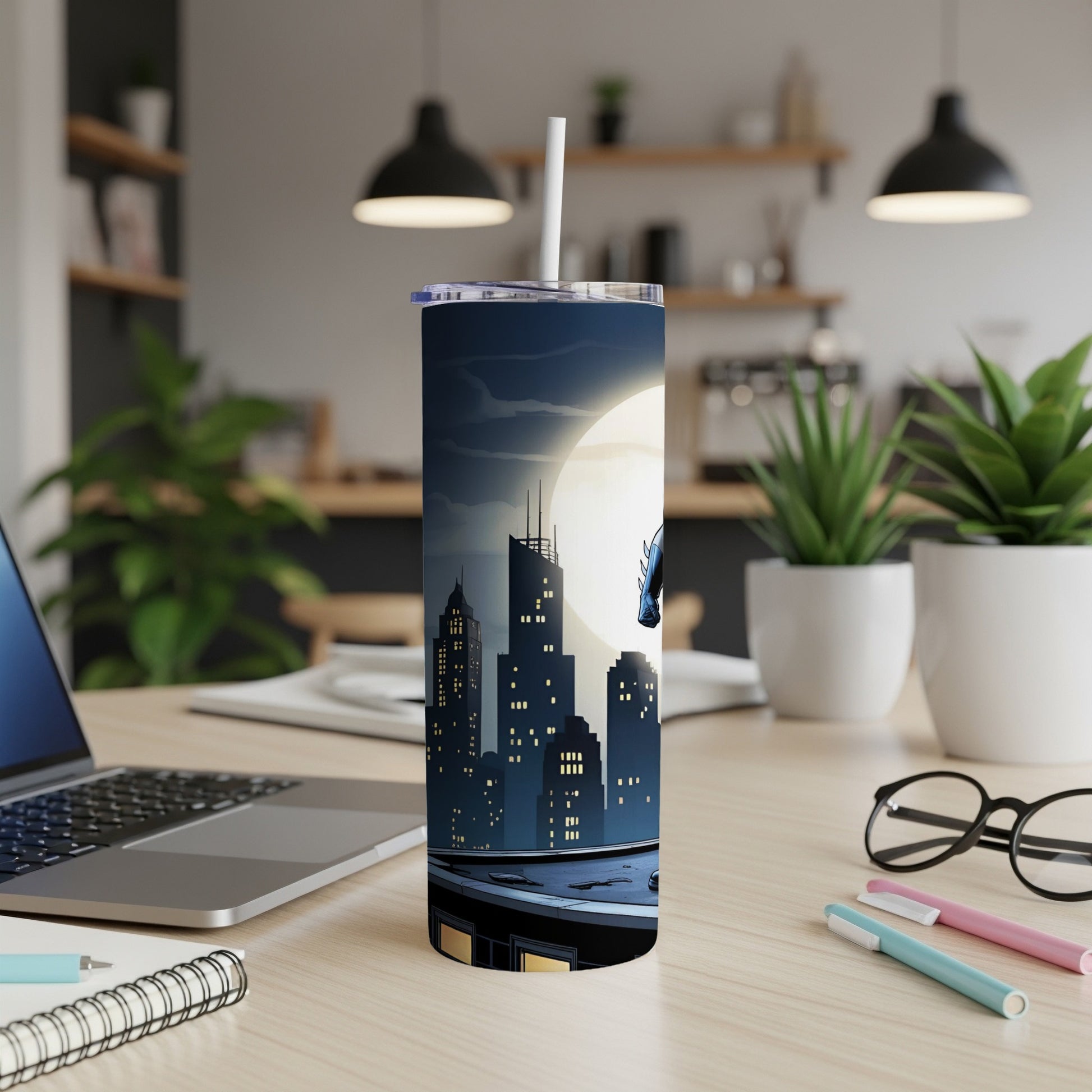 Tall tumbler featuring a cityscape and moon with a superhero silhouette.