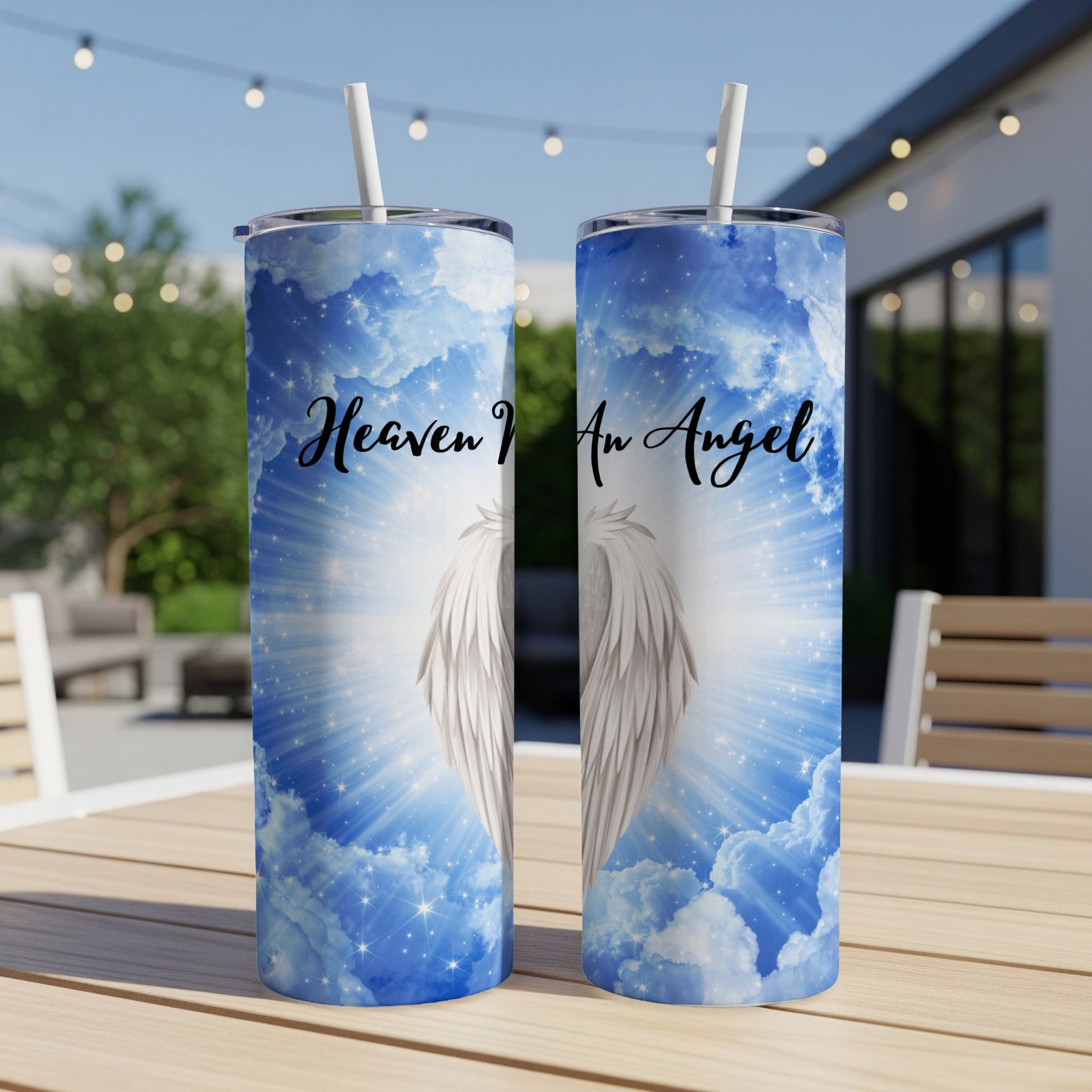 Heaven I Am Angel text on a blue cloudy background with white angel wings.