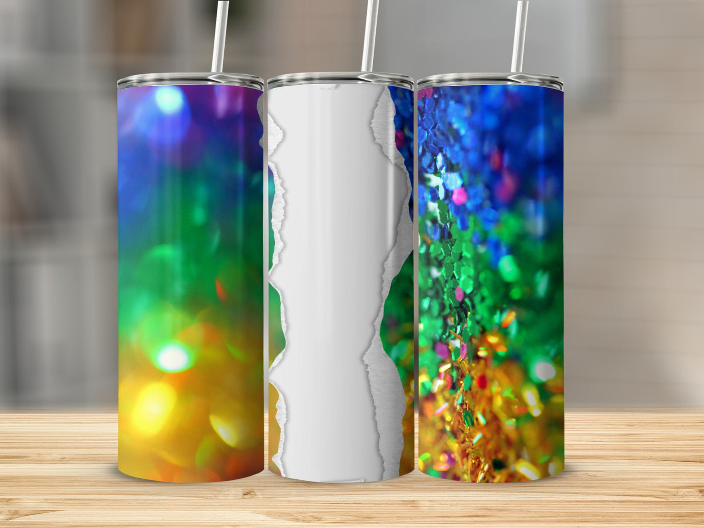 Three tumblers on a wooden surface, two with colorful bokeh backgrounds.