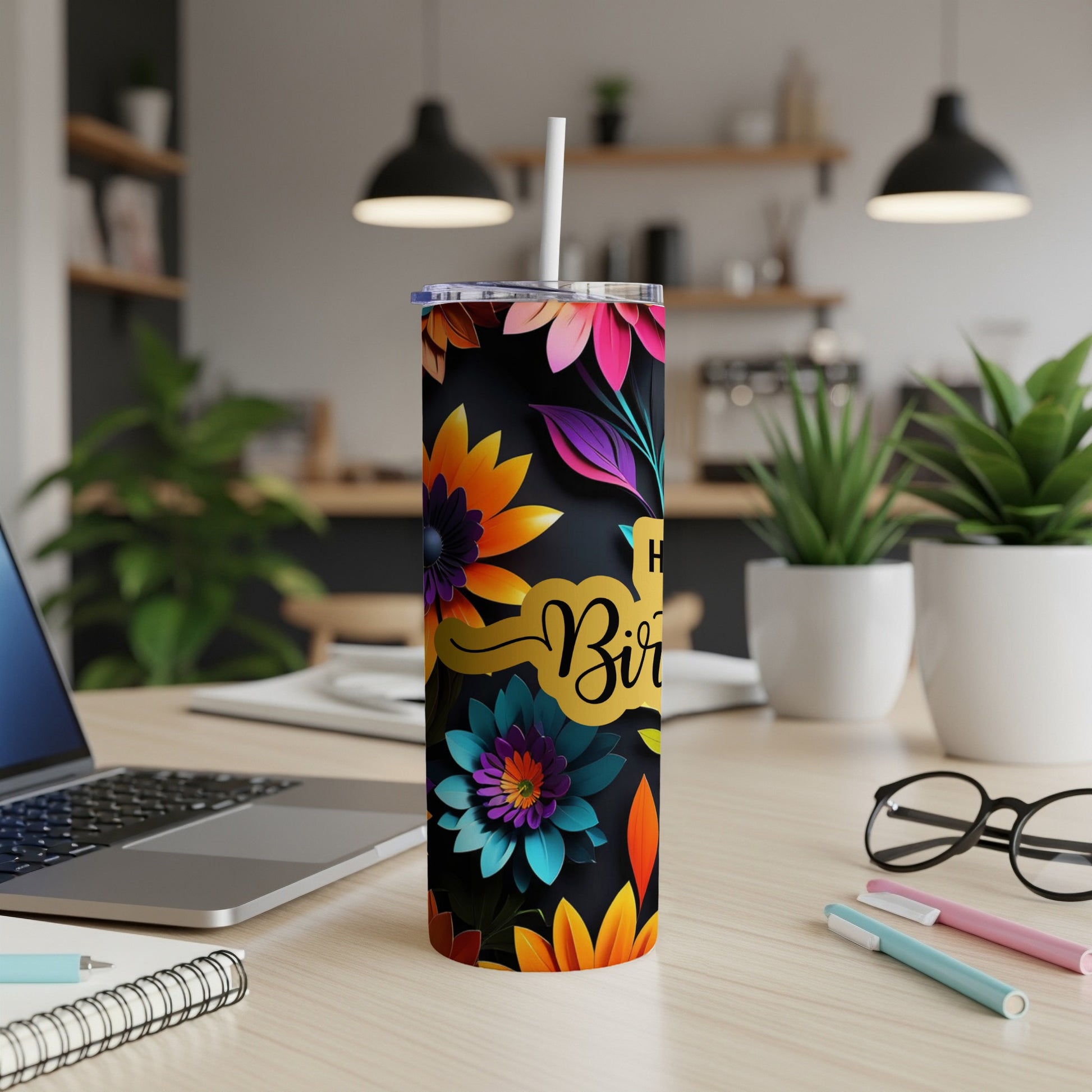 Tall black tumbler with colorful floral design and "Happy Birthday" text.