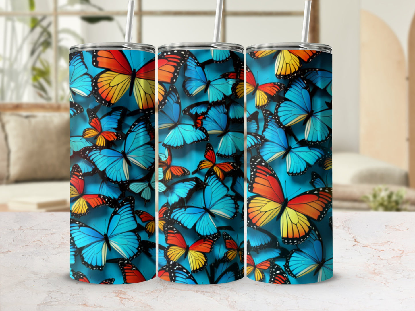 Blue tumbler with a repeating pattern of colorful butterflies.