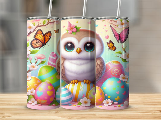 Owl and Easter eggs with butterflies and flowers.