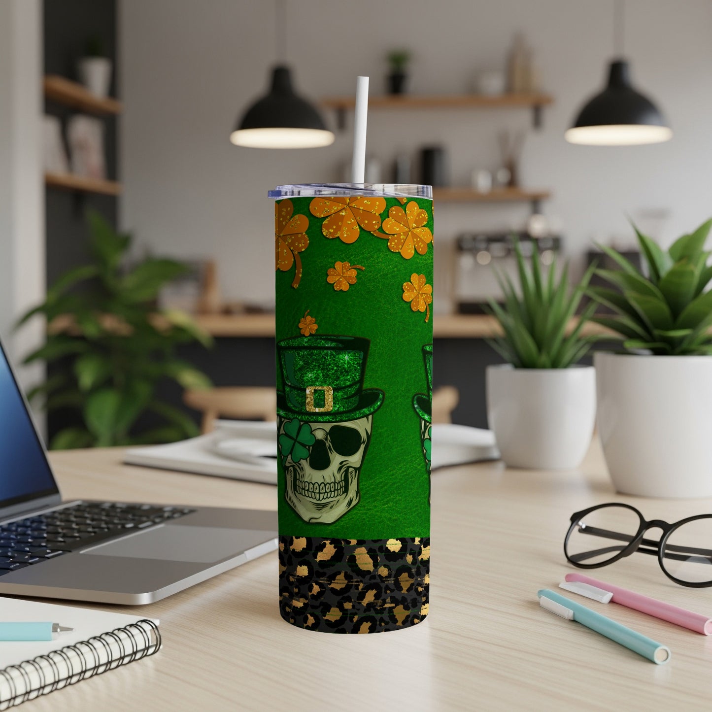 Green tumbler with skull, shamrocks, and leopard print design.