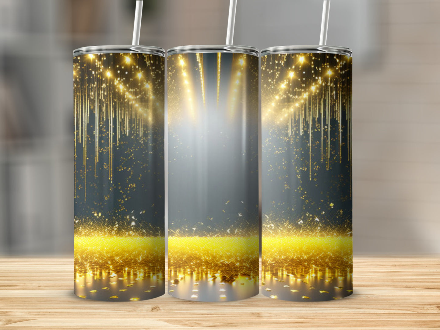 Three illuminated tumblers with a golden spotlight and confetti design.