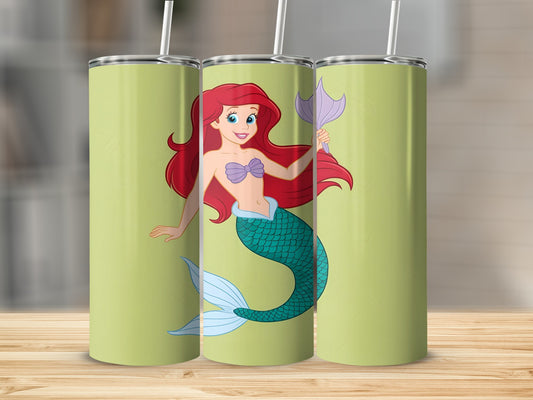 Ariel the Little Mermaid on a light green tumbler with a textured background.