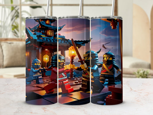 Three Ninjago characters in action on a tumbler against a blurred background.