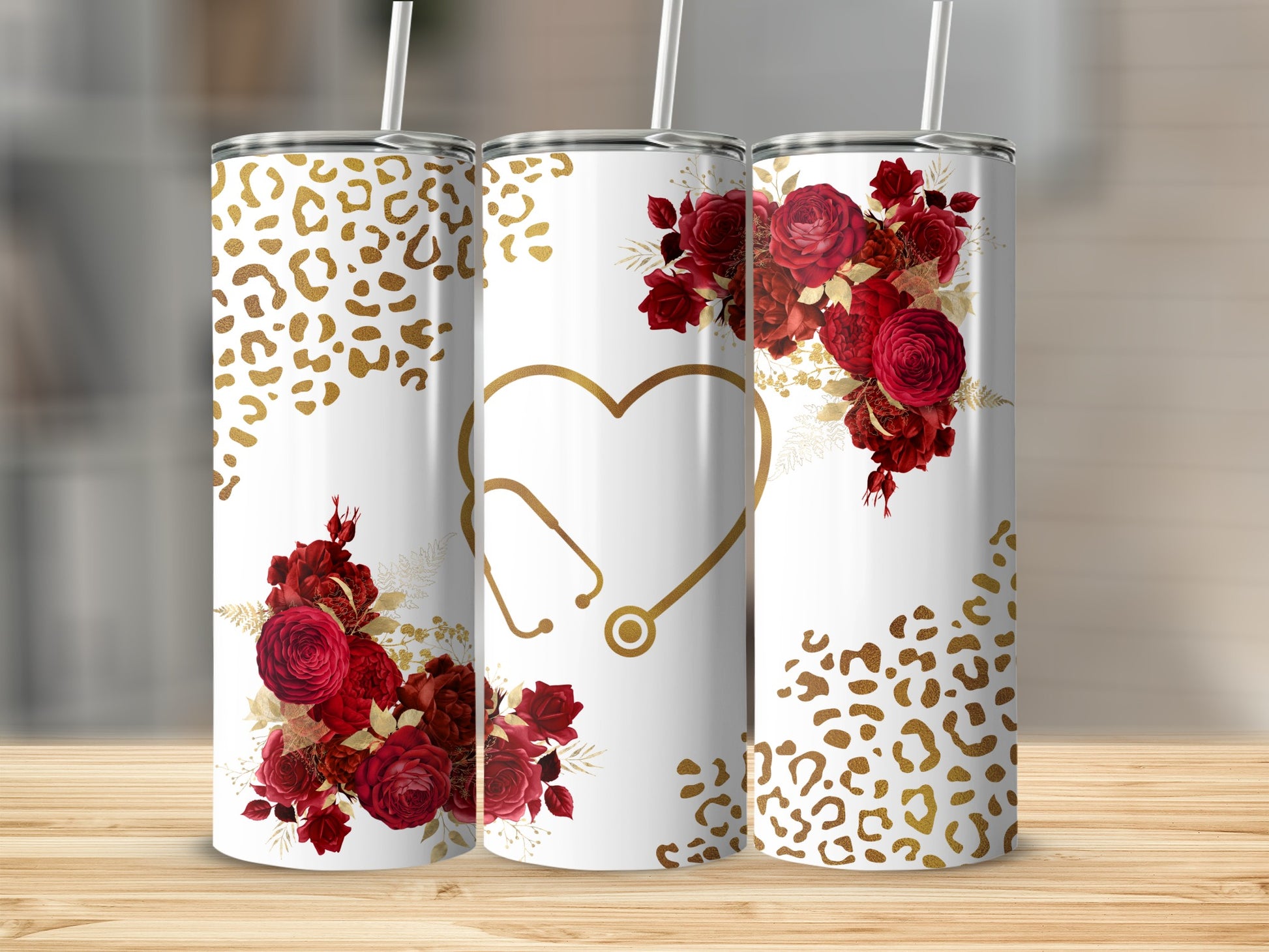 White tumbler with red roses, gold stethoscope, and leopard print.