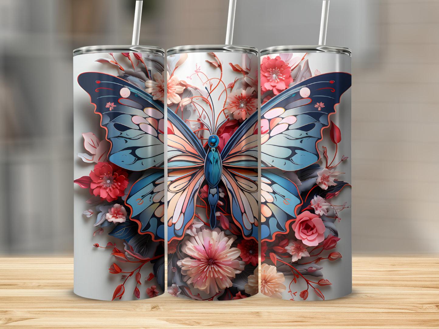 Three tumblers with a detailed butterfly and floral design.