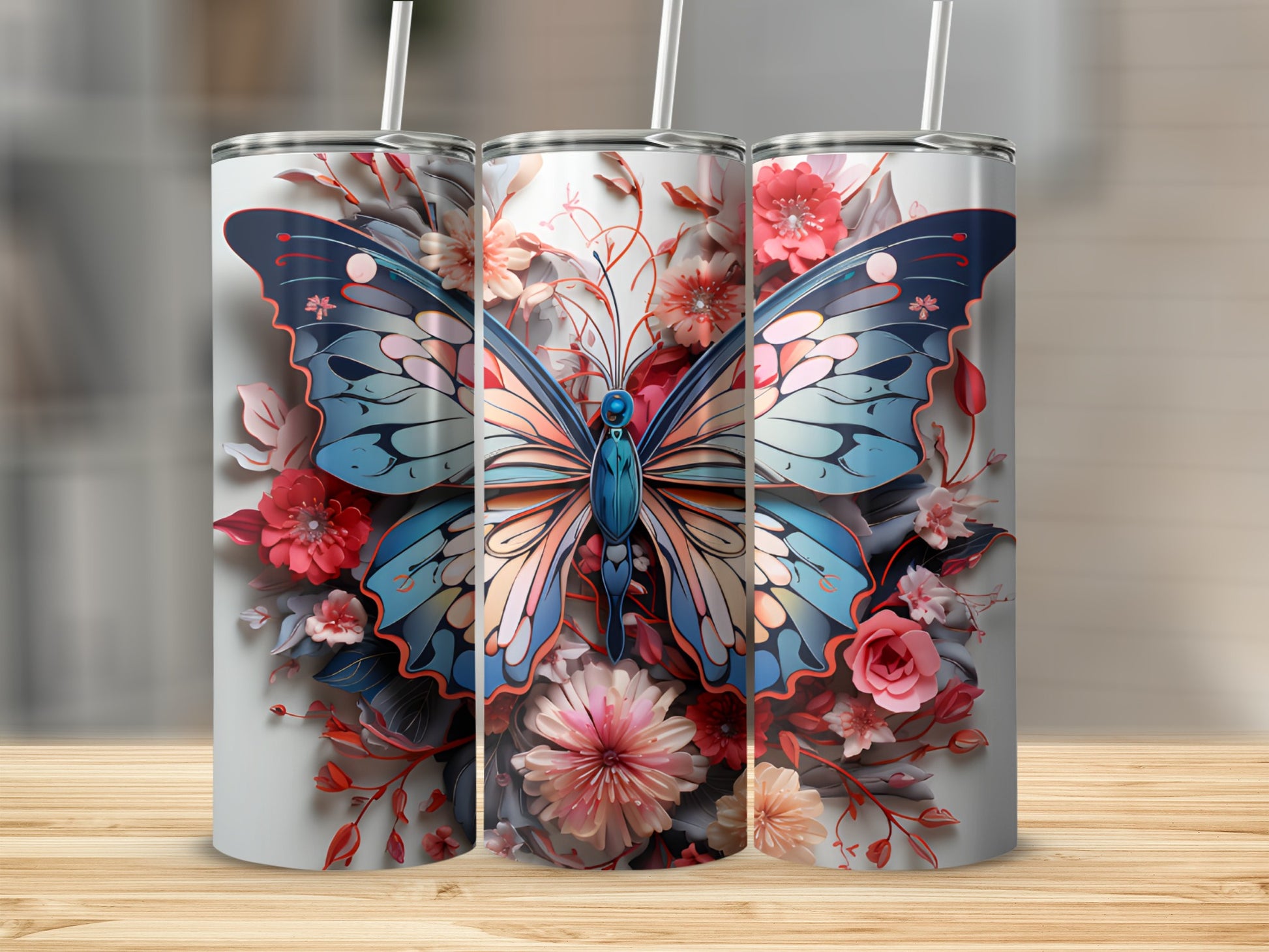 Three tumblers with a detailed butterfly and floral design.