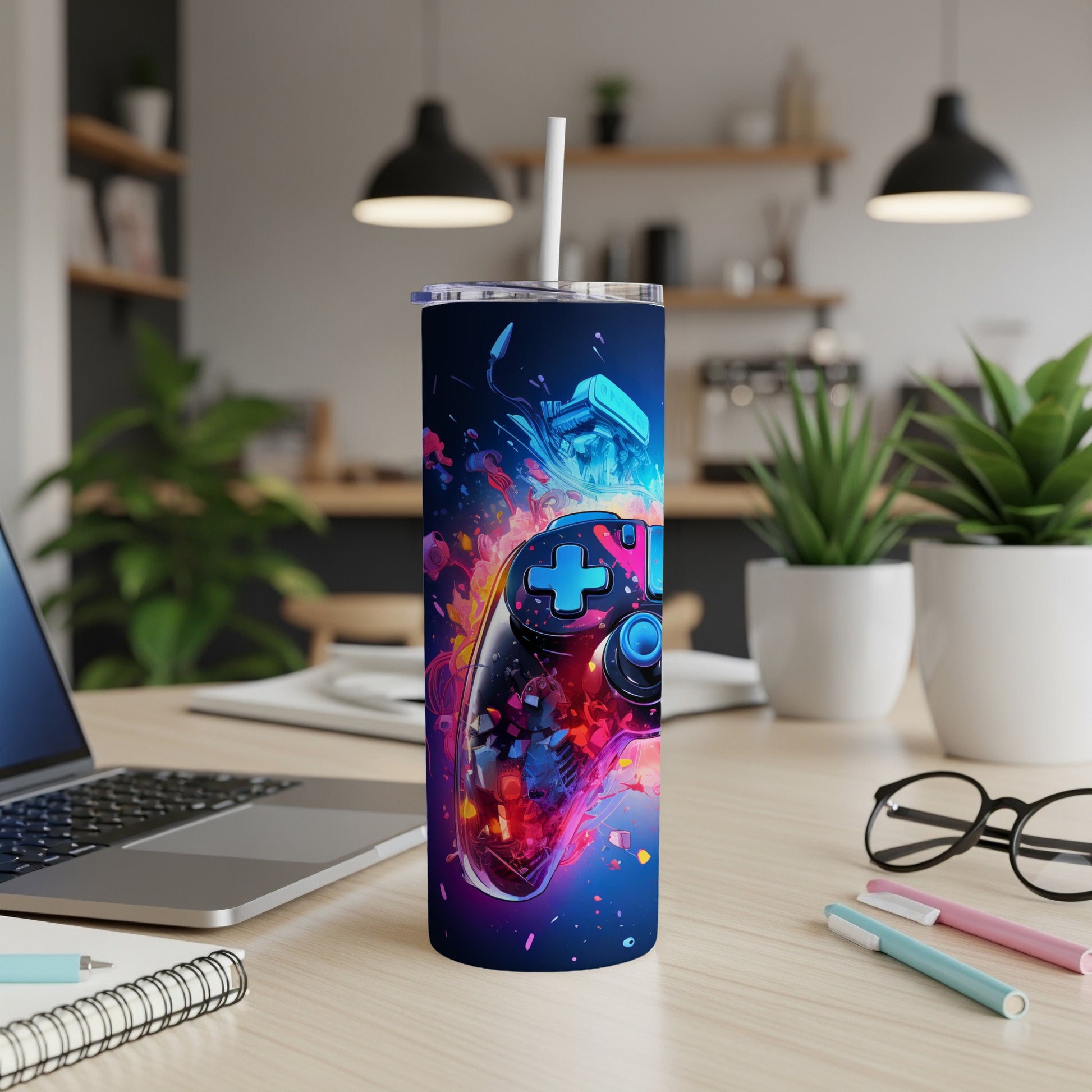 Tumbler with video game controller and abstract colorful gaming art.