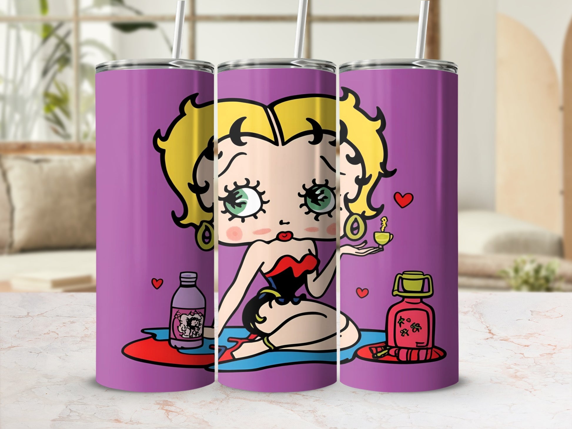 Betty Boop character on a purple tumbler with hearts and perfume bottles.